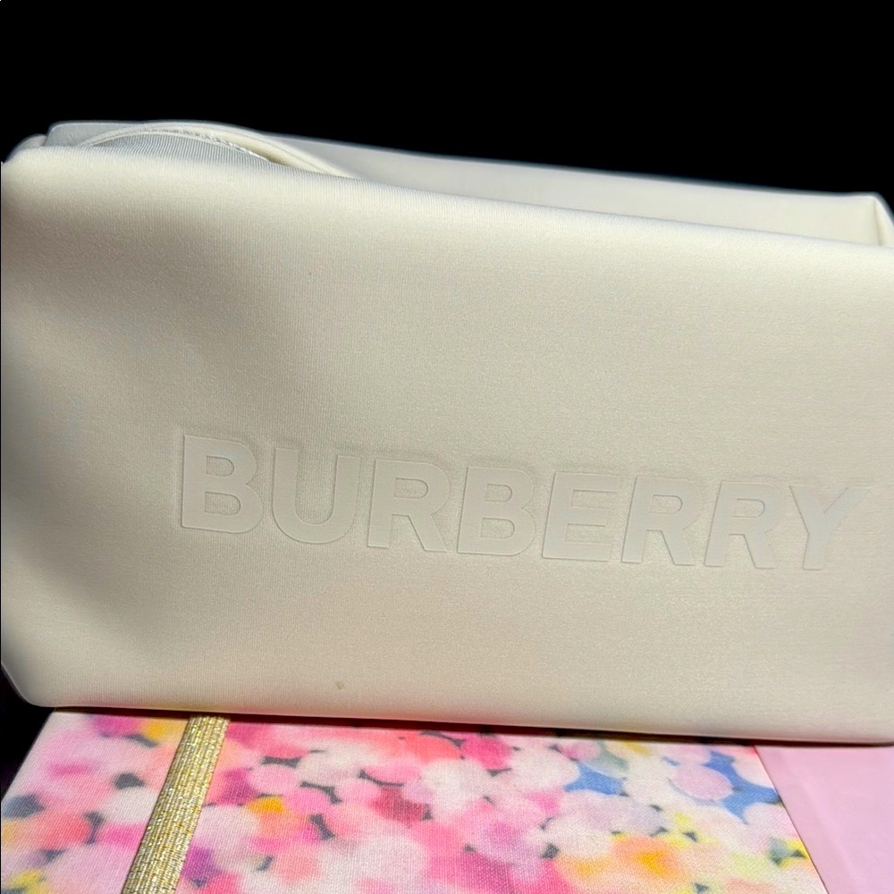 Burberry Cream Embossed Logo Cosmetic Pouch